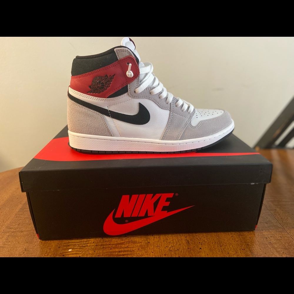 Jordan 1 light smoke greys. Tried on but never worn outside size 10.5